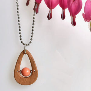 Two smooth wood necklaces with colorful Swarovski beads