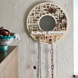 Mirror and earring storage in one.